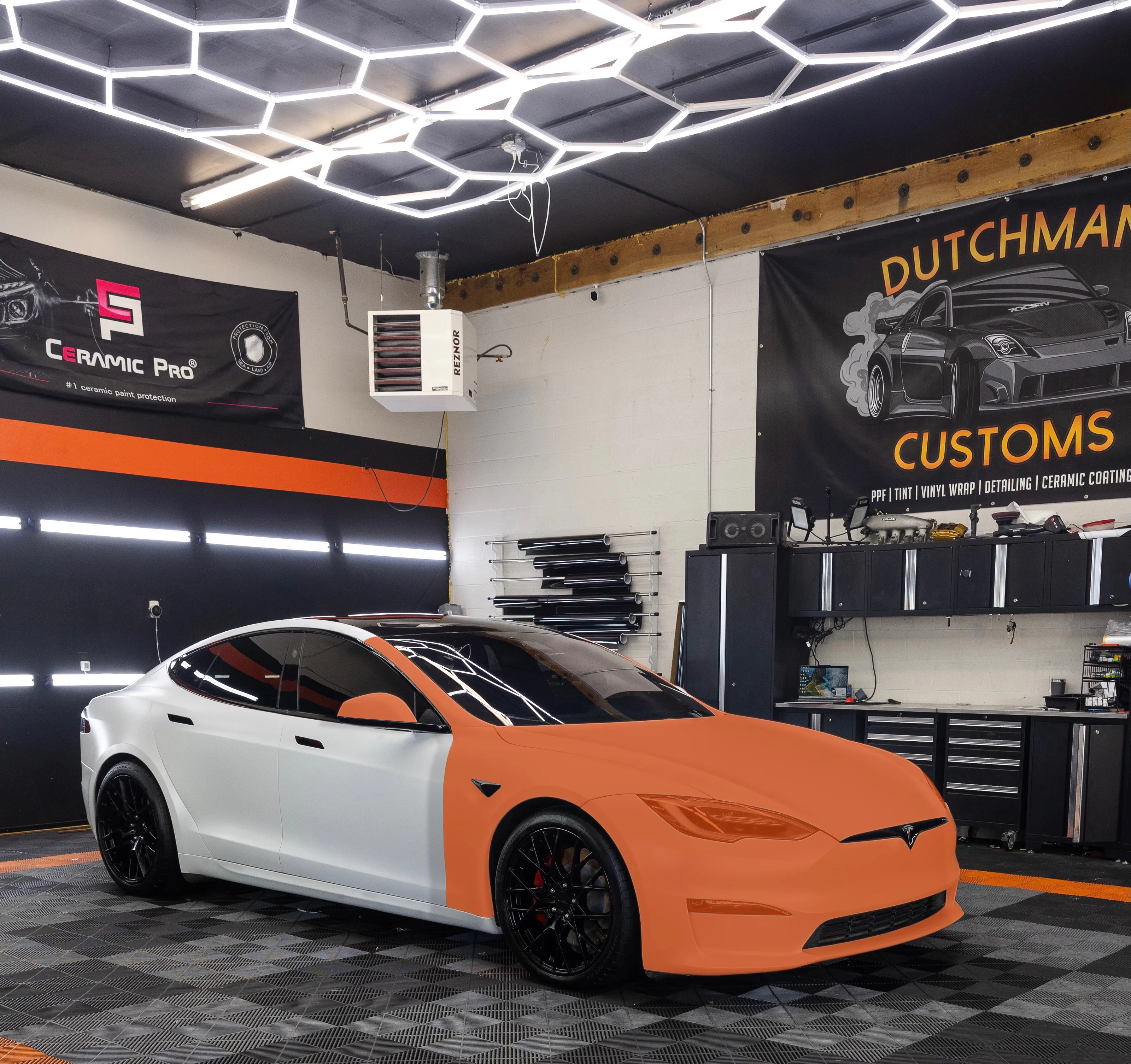 Tesla Model S with the Full Front PPF coverage marked in orange: hood, bumper, fenders, headlights, mirrors